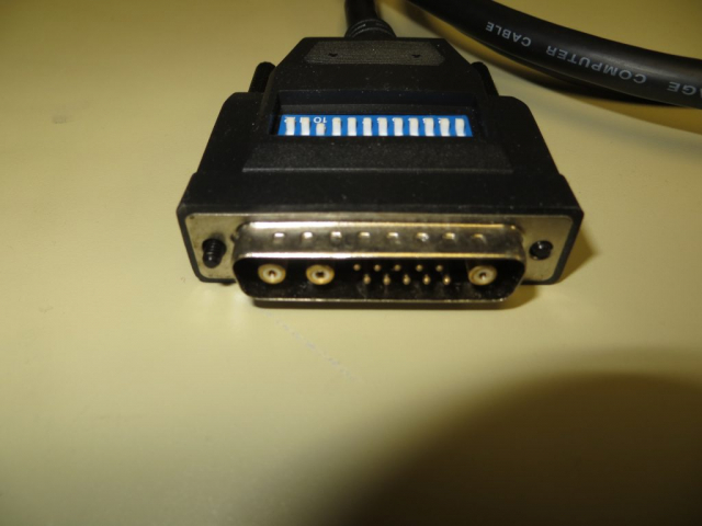 The 13W3 connector side of the 13W3 to VGA adapter cable