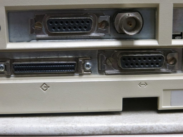 This photo shows le1 with its AUI and Thinnet connector on top, and le0 on the bottom right with just the AUI connector.  The connector on the bottom left is the SCSI connector.